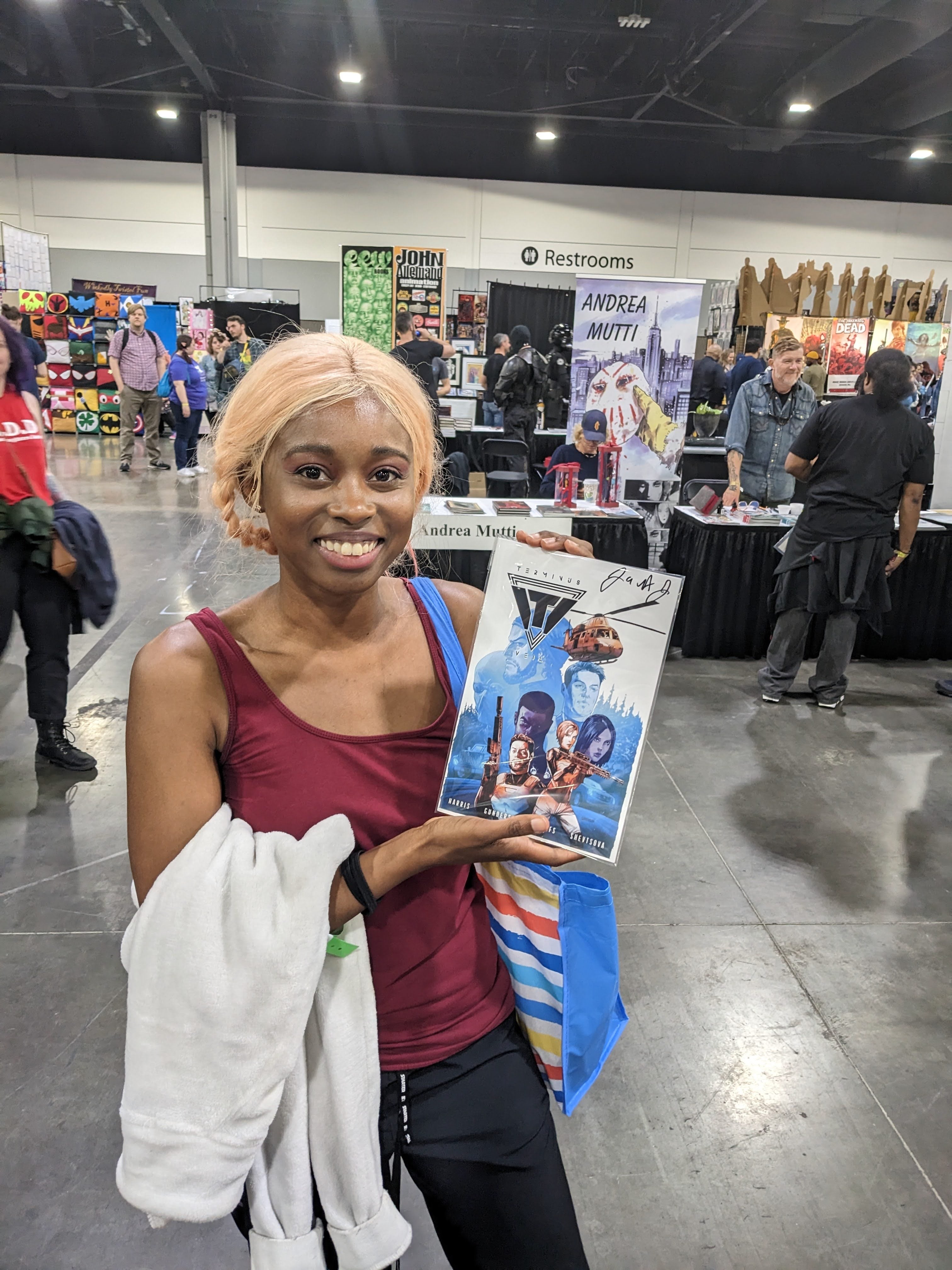 Fan holding signed Terminus Veil at convention